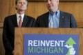 Governor-elect Rick Snyder, center, announces the appointment of House Speaker Andy Dillon, left, as treasurer and former Lt. Governor Dick Posthumus as senior adviser to the Governor at University of Michigan's Gerald R. Ford School of Public Policy in Ann Arbor on Nov. 8, 2010.  Angela J. Cesere | AnnArbor.com